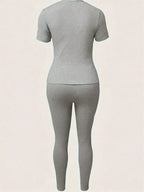 2026 women's new Paris printed two-piece set, casual short sleeved round neck T-shirt and tight pants long pants set