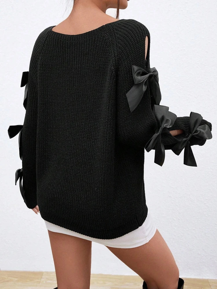 Fashionable bow details hollowed out raglan sleeves knit sweater round neck minimalist sweater